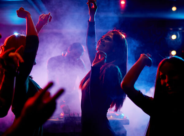 Girls dancing in a lively night club. Entertainment licences are required, as well as alcohol.